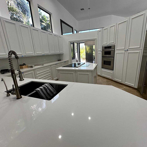 Bright white kitchen with freshly painted cabinetry